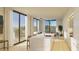 Open concept kitchen with island and access to patio at 318 Sandy Springs Cir # 270, Sandy Springs, GA 30328