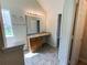 Elegant bathroom with updated vanity and fixtures at 50 Ivans Cir, Covington, GA 30016