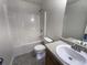 Clean and functional full bathroom with tub shower combo at 50 Ivans Cir, Covington, GA 30016