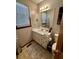 Clean bathroom with single sink vanity, toilet and shower at 3060 Habersham Cir, Covington, GA 30014