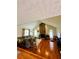 Spacious living room with hardwood floors and stone fireplace at 3060 Habersham Cir, Covington, GA 30014