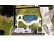 Freeform pool with large deck and fenced backyard at 3060 Habersham Cir, Covington, GA 30014