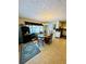 Bright dining area with oval table and access to kitchen at 3060 Habersham Cir, Covington, GA 30014