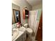 Updated bathroom with shower, toilet and vanity at 3060 Habersham Cir, Covington, GA 30014