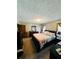 Spacious Primary bedroom with large bed and ample closet space at 3060 Habersham Cir, Covington, GA 30014
