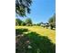 Large grassy yard with mature trees and RV at 3060 Habersham Cir, Covington, GA 30014