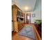 Entryway with hardwood floors, wood cabinet, and rug at 3060 Habersham Cir, Covington, GA 30014