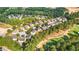 Aerial view of a community with houses, trees, and a golf course at 3037 Nicholas Dr, Villa Rica, GA 30180
