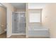 Bathroom boasts a large soaking tub and a separate shower at 3037 Nicholas Dr, Villa Rica, GA 30180