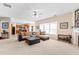 Spacious living room with a large sectional sofa and kitchen view at 3037 Nicholas Dr, Villa Rica, GA 30180