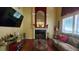 Spacious living room with fireplace and large TV at 5179 Meadowbrooke Chase, Stone Mountain, GA 30088