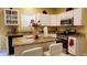 Kitchen features granite countertops and stainless steel appliances at 5179 Meadowbrooke Chase, Stone Mountain, GA 30088