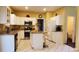 Bright kitchen with granite countertops, stainless steel appliances and breakfast bar at 5179 Meadowbrooke Chase, Stone Mountain, GA 30088
