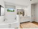 Elegant bathroom with double vanity, soaking tub, and separate shower at 255 Arwen Dr, Mcdonough, GA 30252