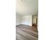 Spacious bedroom with wood-look flooring and ample closet space at 270 Crosstree Ln, Atlanta, GA 30328