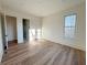 Spacious bedroom with hardwood floors and large window at 270 Crosstree Ln, Atlanta, GA 30328