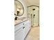Modern bathroom with a large walk-in shower and white cabinetry at 270 Crosstree Ln, Atlanta, GA 30328