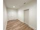 Spacious unfinished basement room with vinyl flooring and ample storage at 270 Crosstree Ln, Atlanta, GA 30328