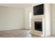 Living room with built-in fireplace and hardwood floors at 270 Crosstree Ln, Atlanta, GA 30328