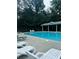 Community pool with lounge chairs and covered seating area at 14 Mckelvey Nw Ct, Cartersville, GA 30121