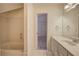 Bathroom with bathtub, toilet, vanity, and access to bedroom at 14 Mckelvey Nw Ct, Cartersville, GA 30121