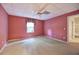 Bright basement bedroom featuring a ceiling fan and neutral wall color at 14 Mckelvey Nw Ct, Cartersville, GA 30121