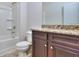 Bathroom with granite countertop, shower, and single vanity at 6120 Ripple Way # 46, South Fulton, GA 30349