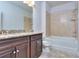 Bathroom with granite countertop, double vanity and bathtub at 6120 Ripple Way # 46, South Fulton, GA 30349