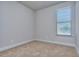 Small bedroom with neutral wall and carpet flooring at 6120 Ripple Way # 46, South Fulton, GA 30349