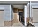 Townhome entry with brick and siding exterior at 6120 Ripple Way # 46, South Fulton, GA 30349