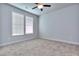 Spacious bedroom with neutral walls and carpet flooring at 6120 Ripple Way # 46, South Fulton, GA 30349