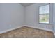 Well-lit bedroom with neutral walls and carpet at 6104 Ripple Way # 50, South Fulton, GA 30349