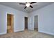 Bright bedroom with carpet, ceiling fan and ensuite bathroom at 6104 Ripple Way # 50, South Fulton, GA 30349