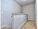 Upstairs hallway with neutral-toned walls and carpeted floor at 6104 Ripple Way # 50, South Fulton, GA 30349