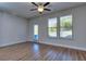 Bright living room featuring hardwood floors and backyard access at 6116 Ripple Way # 47, South Fulton, GA 30349