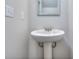 Simple pedestal sink in a small, updated half bathroom at 6116 Ripple Way # 47, South Fulton, GA 30349