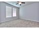 Spacious bedroom with neutral carpeting and large windows at 6116 Ripple Way # 47, South Fulton, GA 30349