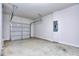 Spacious garage with overhead door and ample space for storage at 6116 Ripple Way # 47, South Fulton, GA 30349