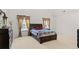 Spacious bedroom with carpeted floors and large windows at 3756 Bondurant Dr, Douglasville, GA 30135