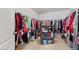 Large walk-in closet with ample hanging space and shelving at 3756 Bondurant Dr, Douglasville, GA 30135