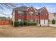 Two story brick home with two car garage and manicured lawn at 3756 Bondurant Dr, Douglasville, GA 30135