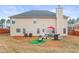 Spacious backyard with patio, grill, and seating area at 3756 Bondurant Dr, Douglasville, GA 30135