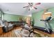 Spacious living room featuring a sectional sofa, coffee table, and treadmill at 3756 Bondurant Dr, Douglasville, GA 30135