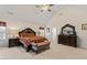Main bedroom with large bed and sitting area at 3756 Bondurant Dr, Douglasville, GA 30135