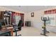 Home office with desk, computer, and exercise bike at 3756 Bondurant Dr, Douglasville, GA 30135