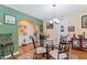 Small dining area with glass-top table and four chairs, near kitchen at 3756 Bondurant Dr, Douglasville, GA 30135