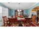 Bright dining room with hardwood floors and a charming built-in hutch at 3756 Bondurant Dr, Douglasville, GA 30135