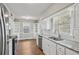 Modern kitchen with granite countertops and stainless steel appliances at 1886 S Gordon Sw St, Atlanta, GA 30310