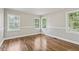 Spacious bedroom with hardwood floors and large windows at 1886 S Gordon Sw St, Atlanta, GA 30310