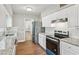 Modern kitchen with granite countertops and stainless steel appliances at 1886 S Gordon Sw St, Atlanta, GA 30310